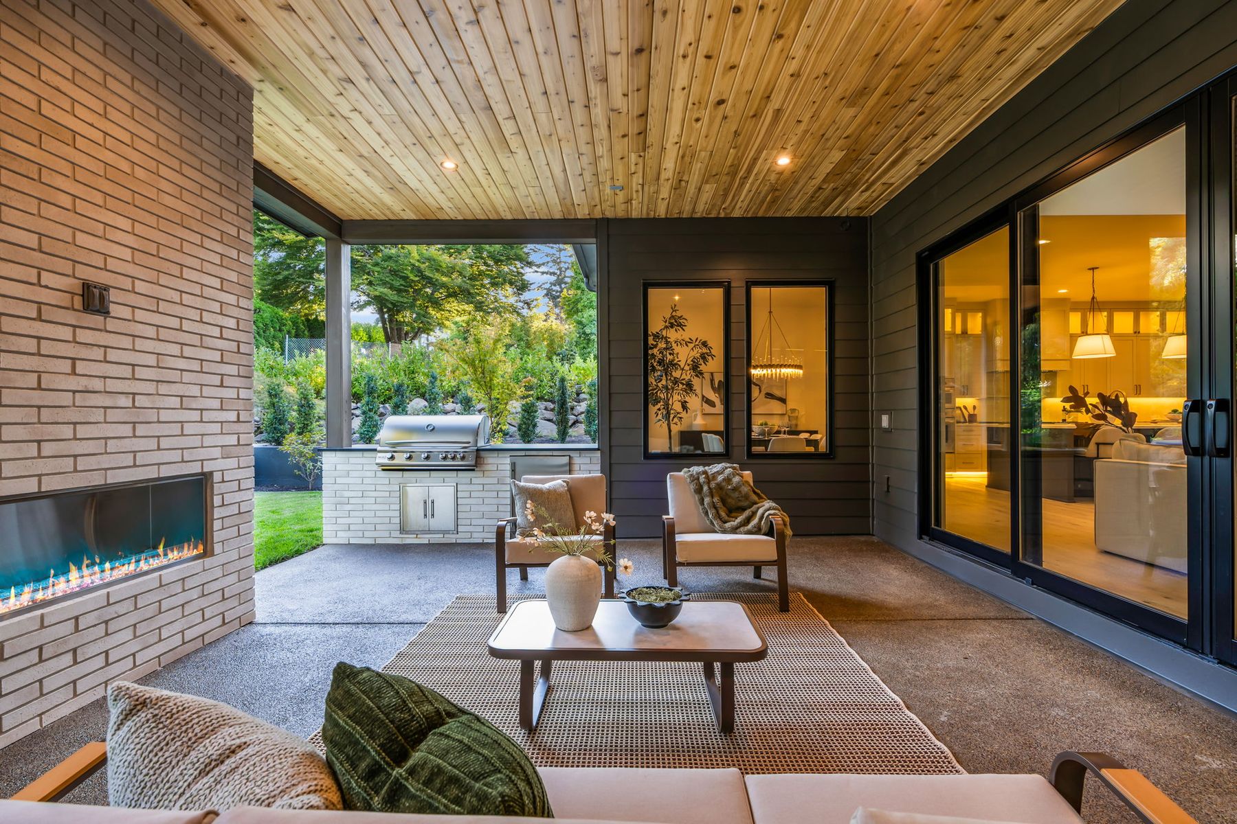 Covered outdoor room with fireplace